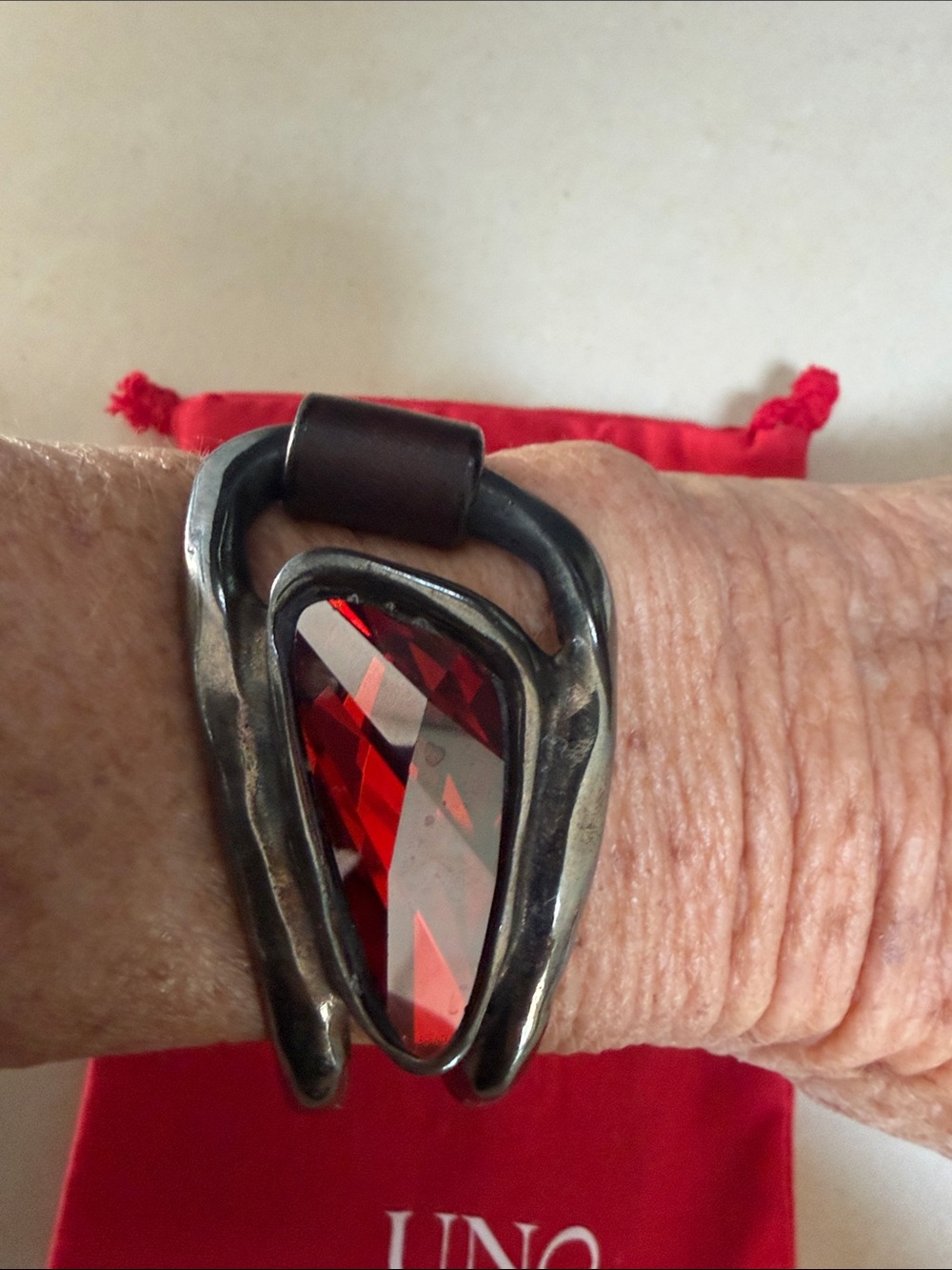 UNO de 50 Red Faceted Stone Bracelet with Dark Metal Frame
